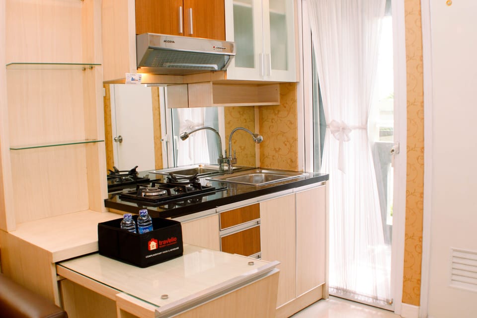 Apartment, 2 Bedrooms | Private kitchen | Fridge, stovetop, cookware/dishes/utensils, dining tables