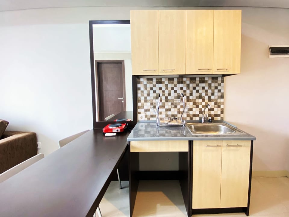 Apartment, 2 Bedrooms | Private kitchen | Fridge, stovetop, cookware/dishes/utensils, dining tables