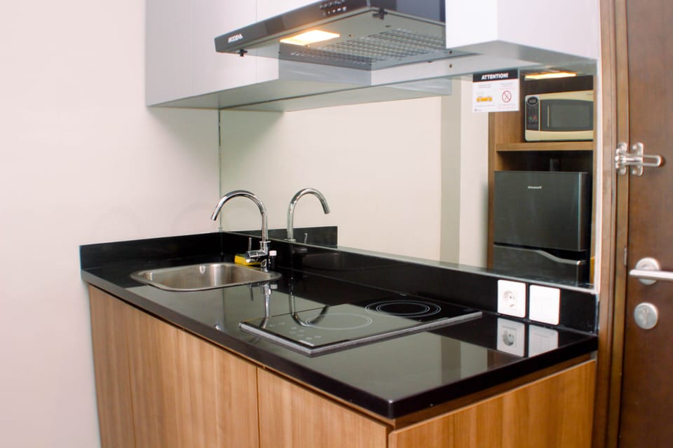 Apartment, 1 Bedroom | Private kitchen | Fridge, stovetop, cookware/dishes/utensils, dining tables