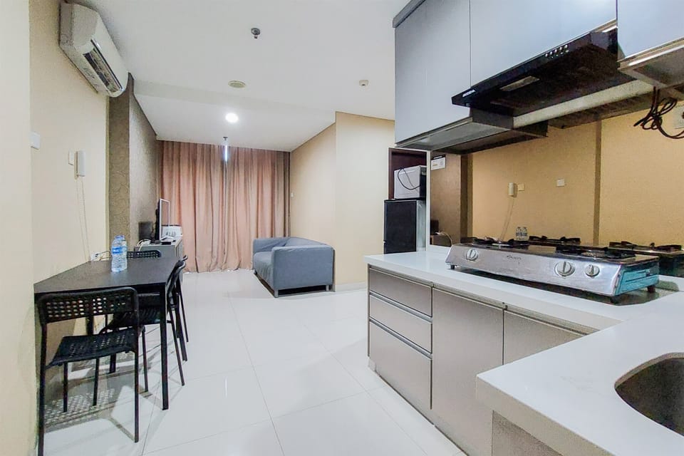 Apartment, 2 Bedrooms | Private kitchen | Fridge, stovetop, cookware/dishes/utensils, dining tables
