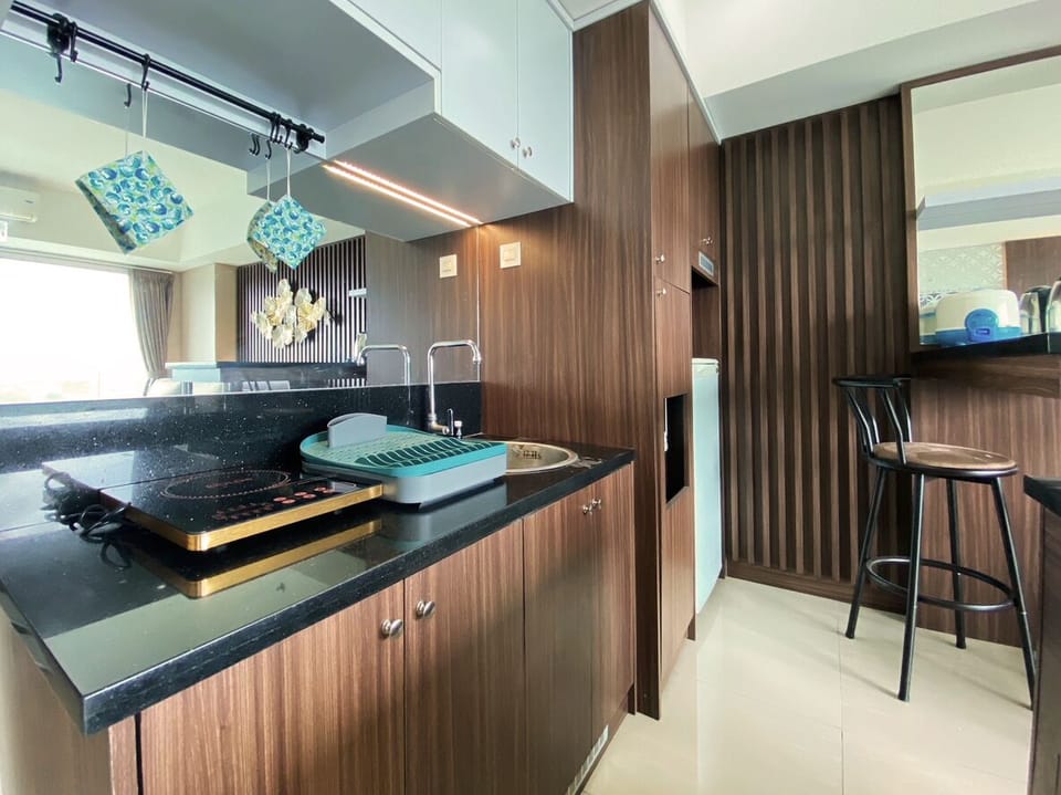 Apartment, 2 Bedrooms | Private kitchen | Fridge, stovetop, cookware/dishes/utensils, dining tables
