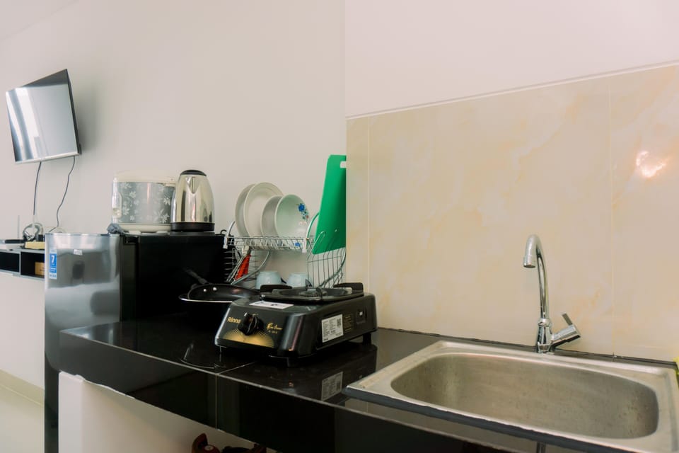 Studio | Private kitchen | Fridge, stovetop, cookware/dishes/utensils, dining tables