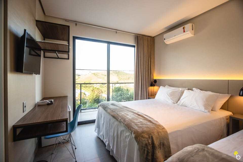 Premium Triple Room, Lake View | Laptop workspace, free WiFi, bed sheets