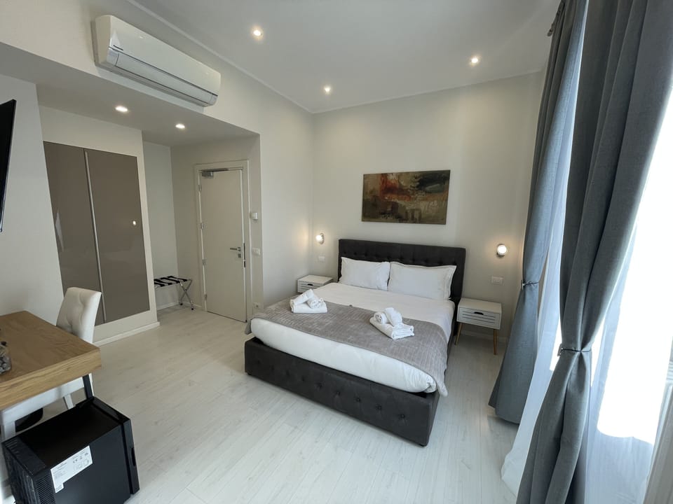 Deluxe Double Room | Down comforters, in-room safe, individually decorated