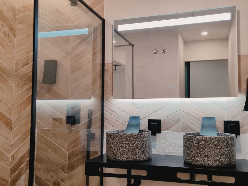 Quadruple Room, Non Smoking | Bathroom | Shower, hair dryer, towels, soap