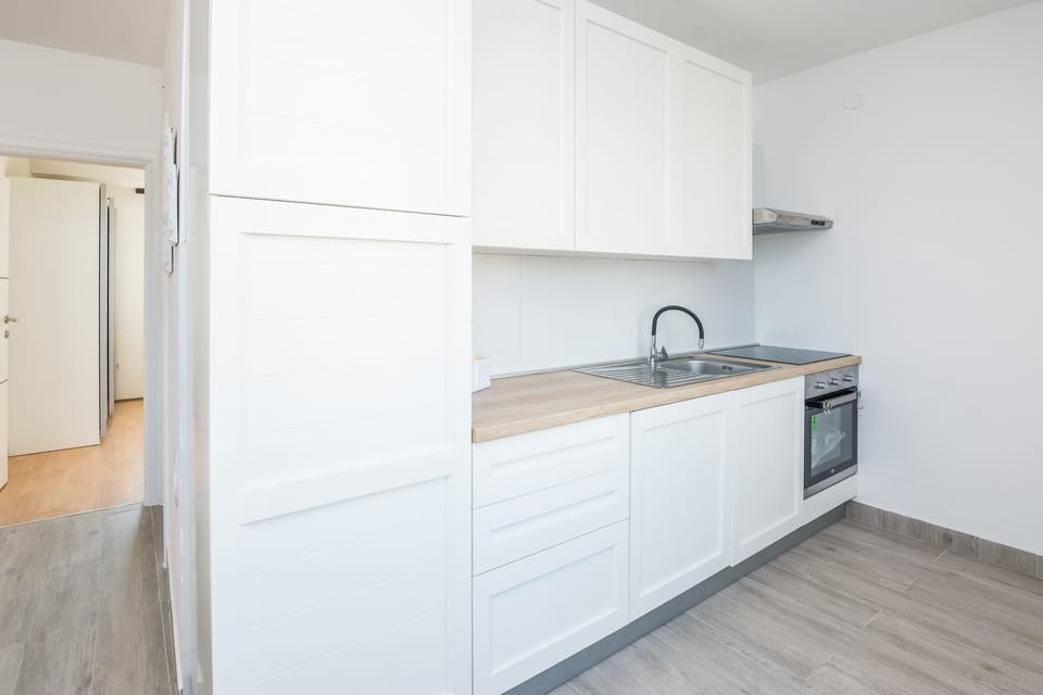 Family Apartment A1 | Private kitchen | Fridge, microwave, oven, stovetop