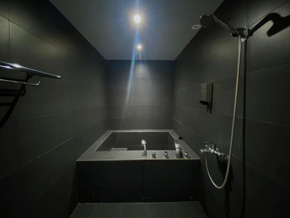 Superior Quadruple Room | Bathroom | Shower, hair dryer, slippers, towels
