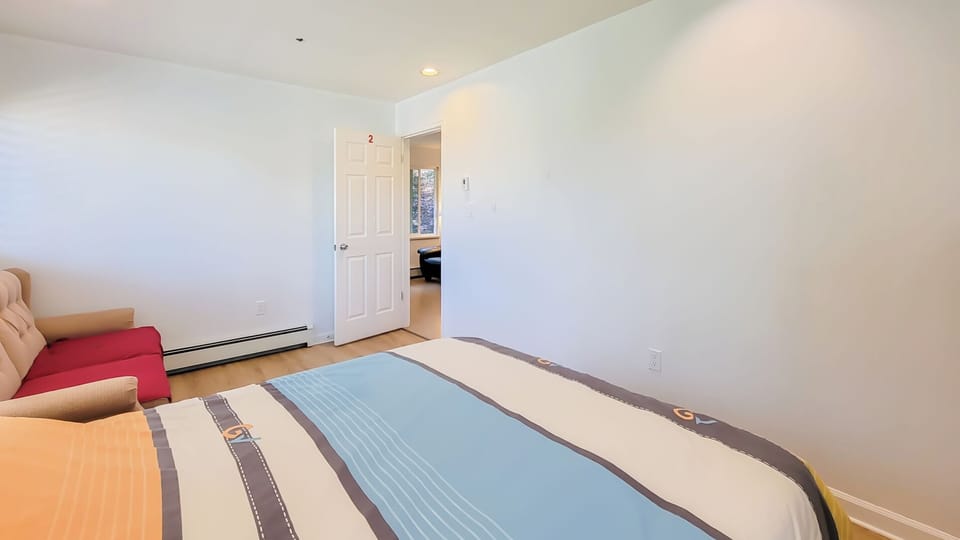Shower, hair dryer, slippers, towels
