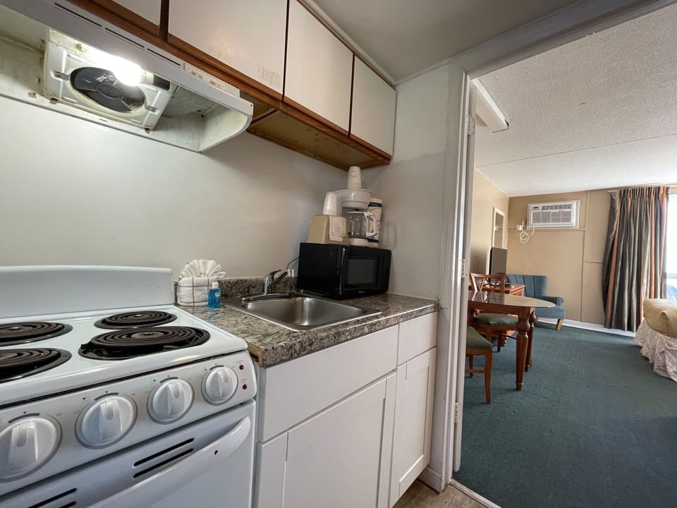 Standard Triple Room, Multiple Beds, Kitchen, Resort View | Private kitchenette | Coffee/tea maker, fridge, microwave