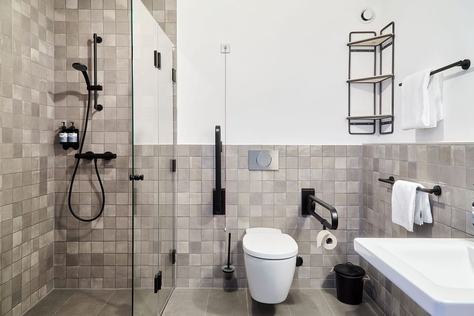 Deluxe Double Room, Resort View, Courtyard Area | Bathroom | Shower, hair dryer, bathrobes, towels