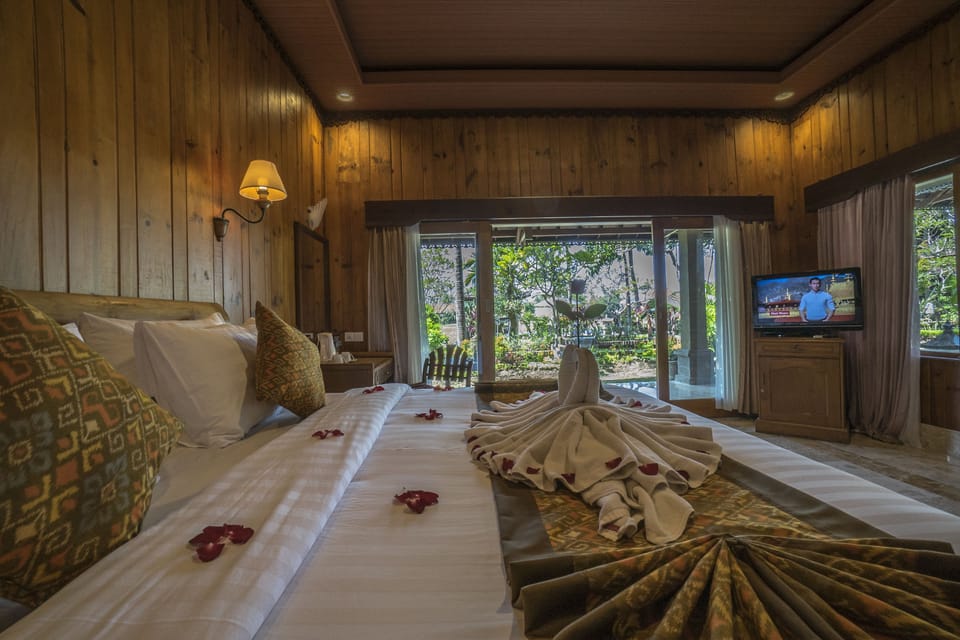 Deluxe Room, 1 Bedroom, Terrace, Garden View | In-room safe, desk, blackout drapes, cribs/infant beds