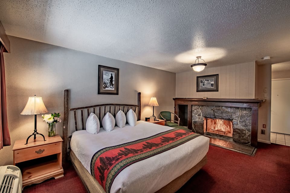 Room, 1 King Bed, Fireplace | In-room safe, blackout drapes, iron/ironing board, free WiFi