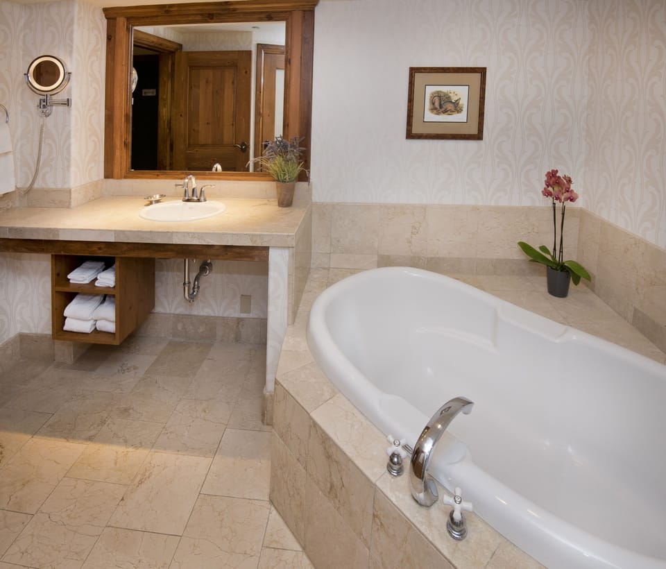 Designer toiletries, hair dryer, bathrobes, slippers