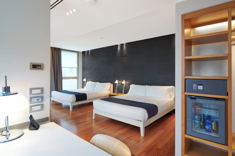 Executive Family | Down comforters, minibar, in-room safe, desk