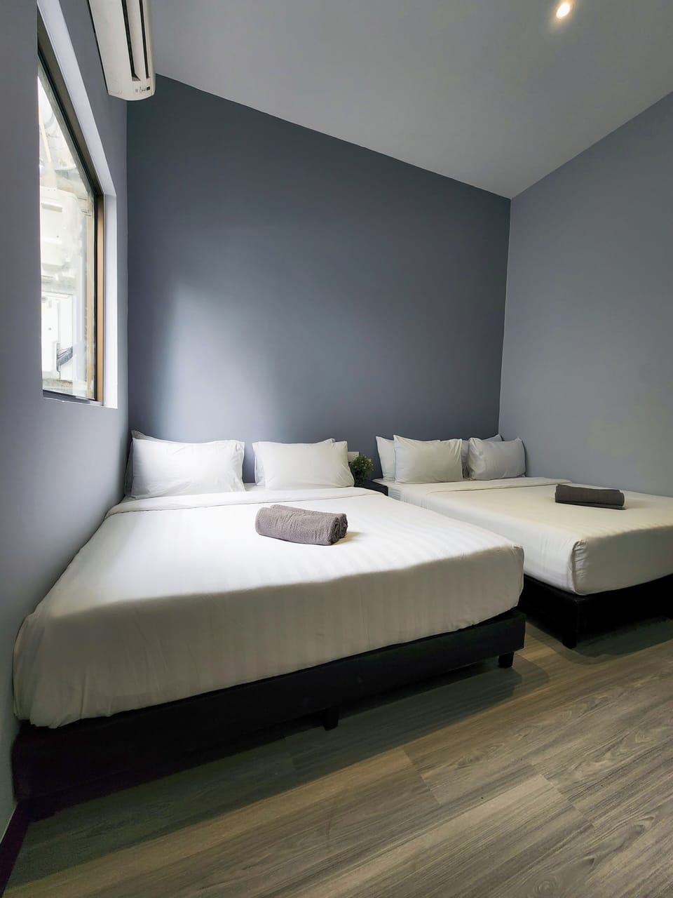 Family Quadruple Room | Blackout drapes, iron/ironing board, free WiFi, bed sheets