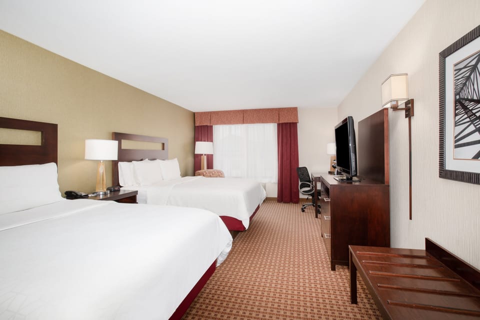 Standard Room, 2 Queen Beds | Hypo-allergenic bedding available, pillowtop beds, in-room safe, desk