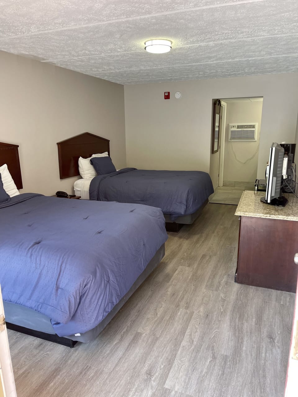 Standard Room, 2 Queen Beds, Non Smoking | Blackout drapes, iron/ironing board, free WiFi, bed sheets