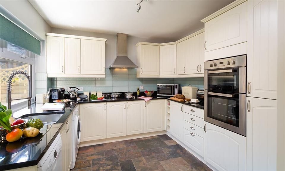 Fridge, dishwasher, cookware/dishes/utensils