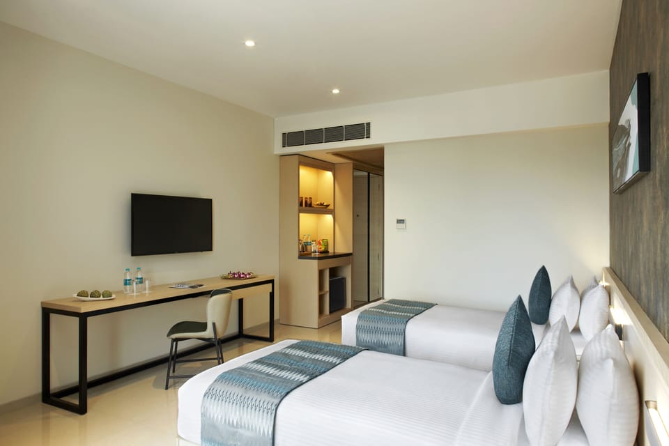 Premium bedding, memory foam beds, minibar, in-room safe