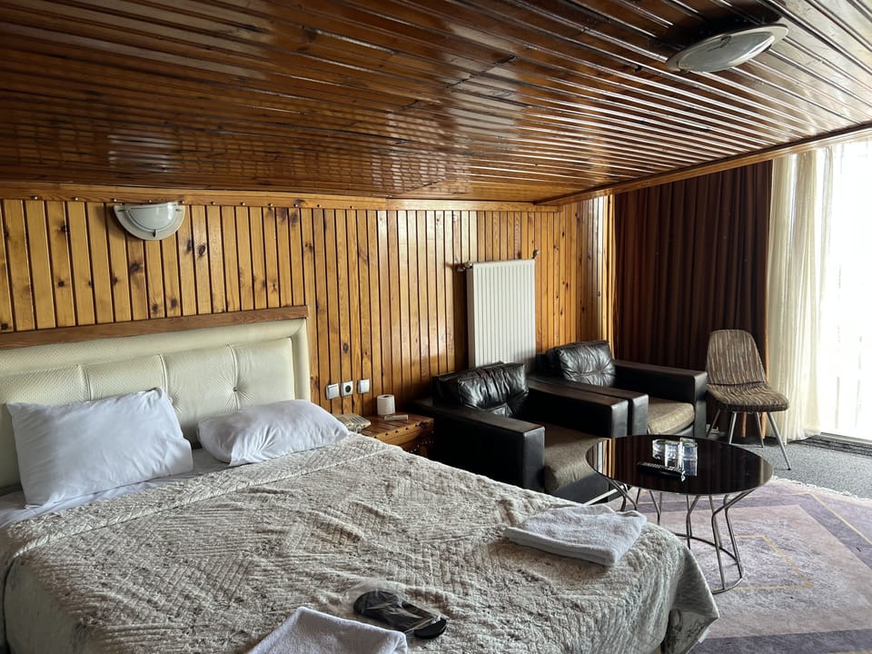 Classic Studio Suite, 2 Double Beds, Smoking, Sea View | Premium bedding, WiFi (free), bed sheets
