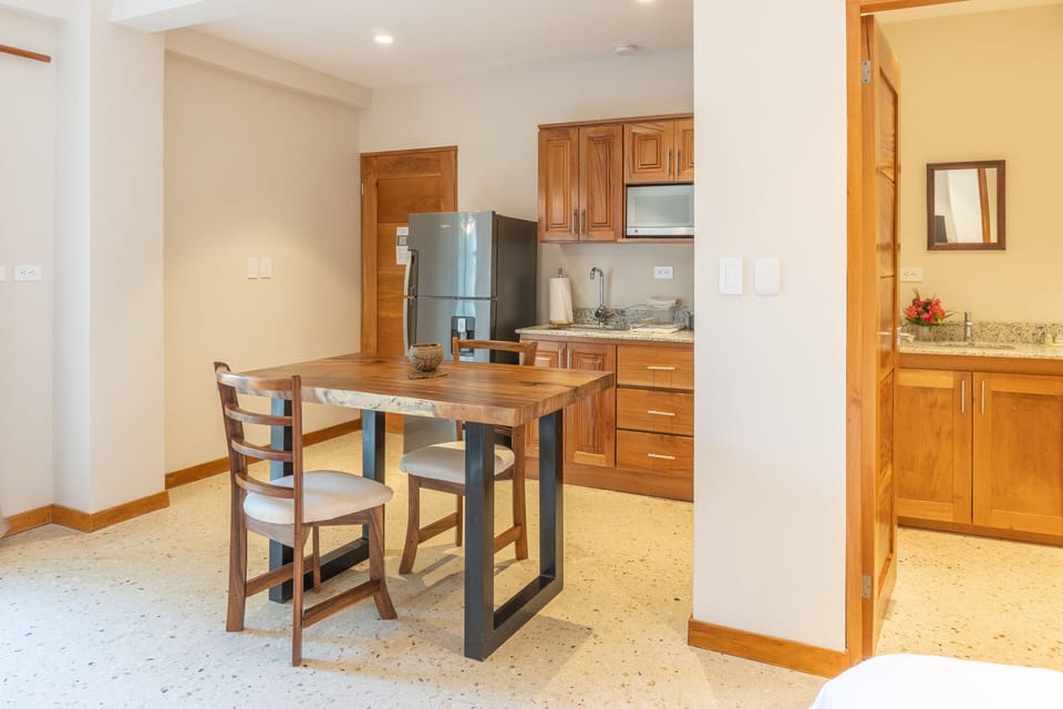 Luxury Studio, Ground Floor | Private kitchen | Full-size fridge, microwave, stovetop, coffee/tea maker