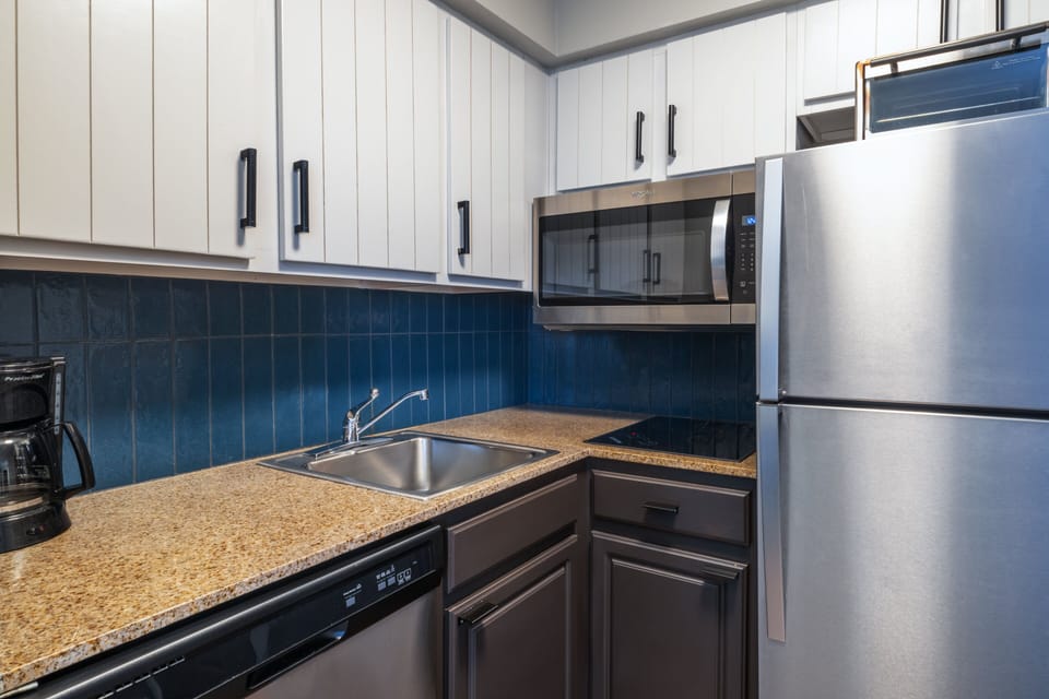 Pillowtop beds, desk, laptop workspace, blackout drapes