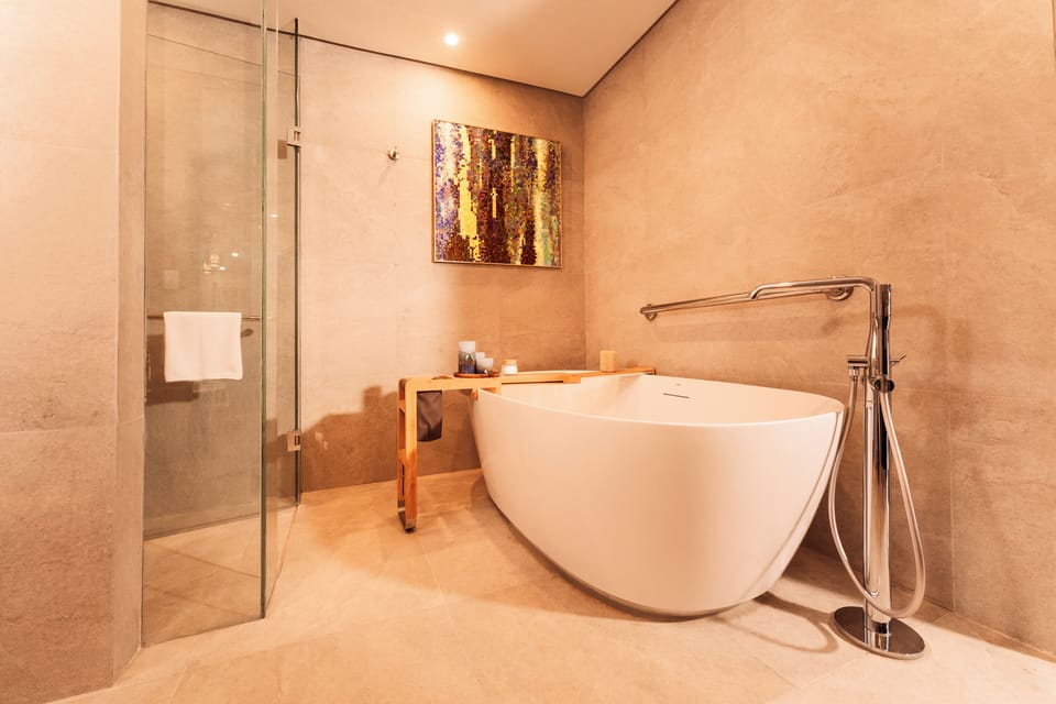 Presidential Suite, Multiple Beds, Ocean View | Bathroom | Shower, rainfall showerhead, eco-friendly toiletries, hair dryer