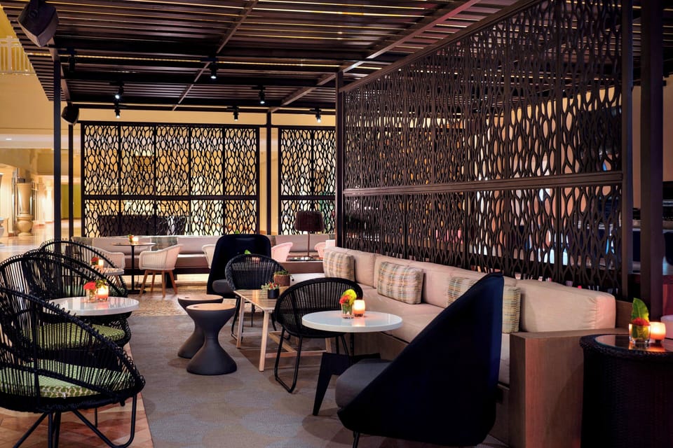 3 bars/lounges, swim-up bar, poolside bar, beach bar