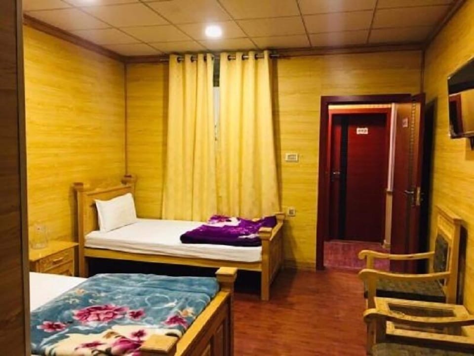 Twin Room | Iron/ironing board (on request)