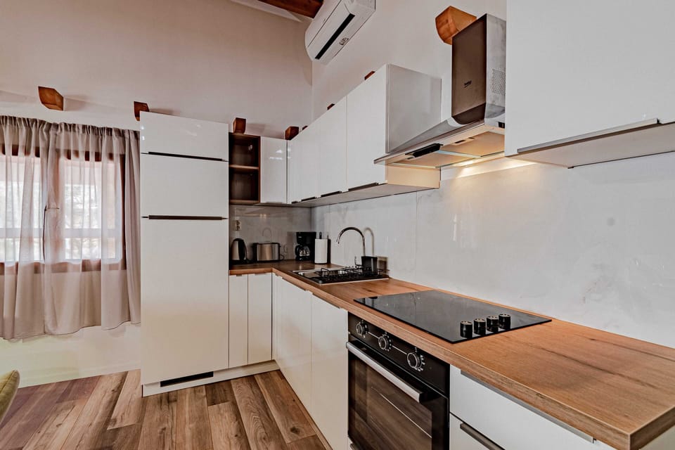 Villa (Three Bedroom Villa with Sea View) | Private kitchen | Fridge