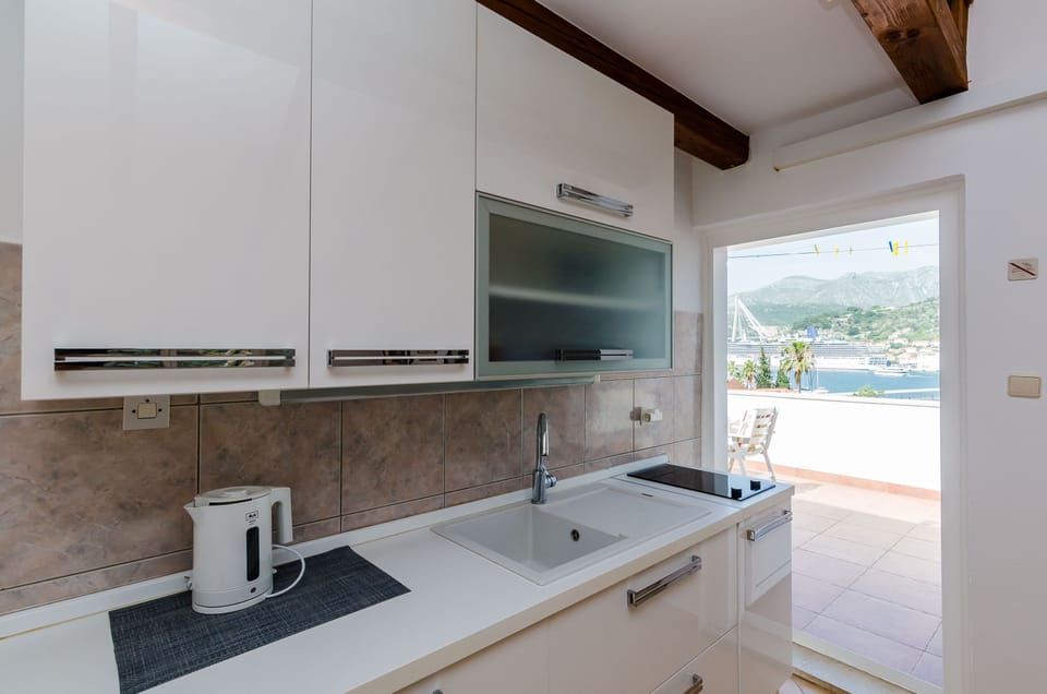 Apartment (One-Bedroom Apartment with Terrace an) | Private kitchenette | Fridge