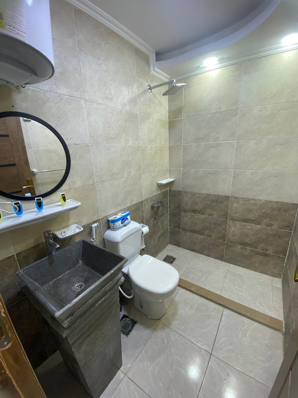 Combined shower/tub, designer toiletries, hair dryer, bathrobes