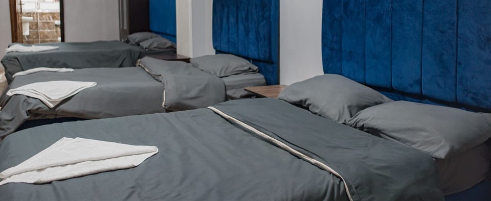 Family Triple Room | Egyptian cotton sheets, premium bedding, minibar, desk