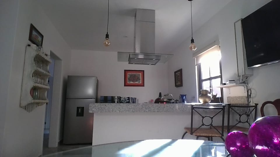Microwave, blender, cookware/dishes/utensils, dining tables