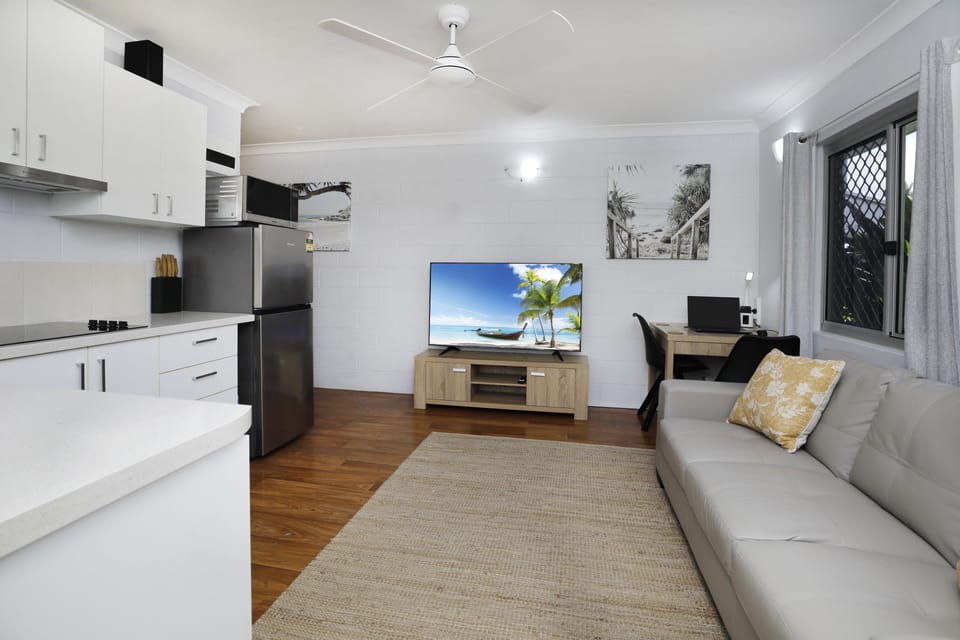 Classic Apartment | Living area | 58-inch Smart TV with cable channels, TV, Netflix
