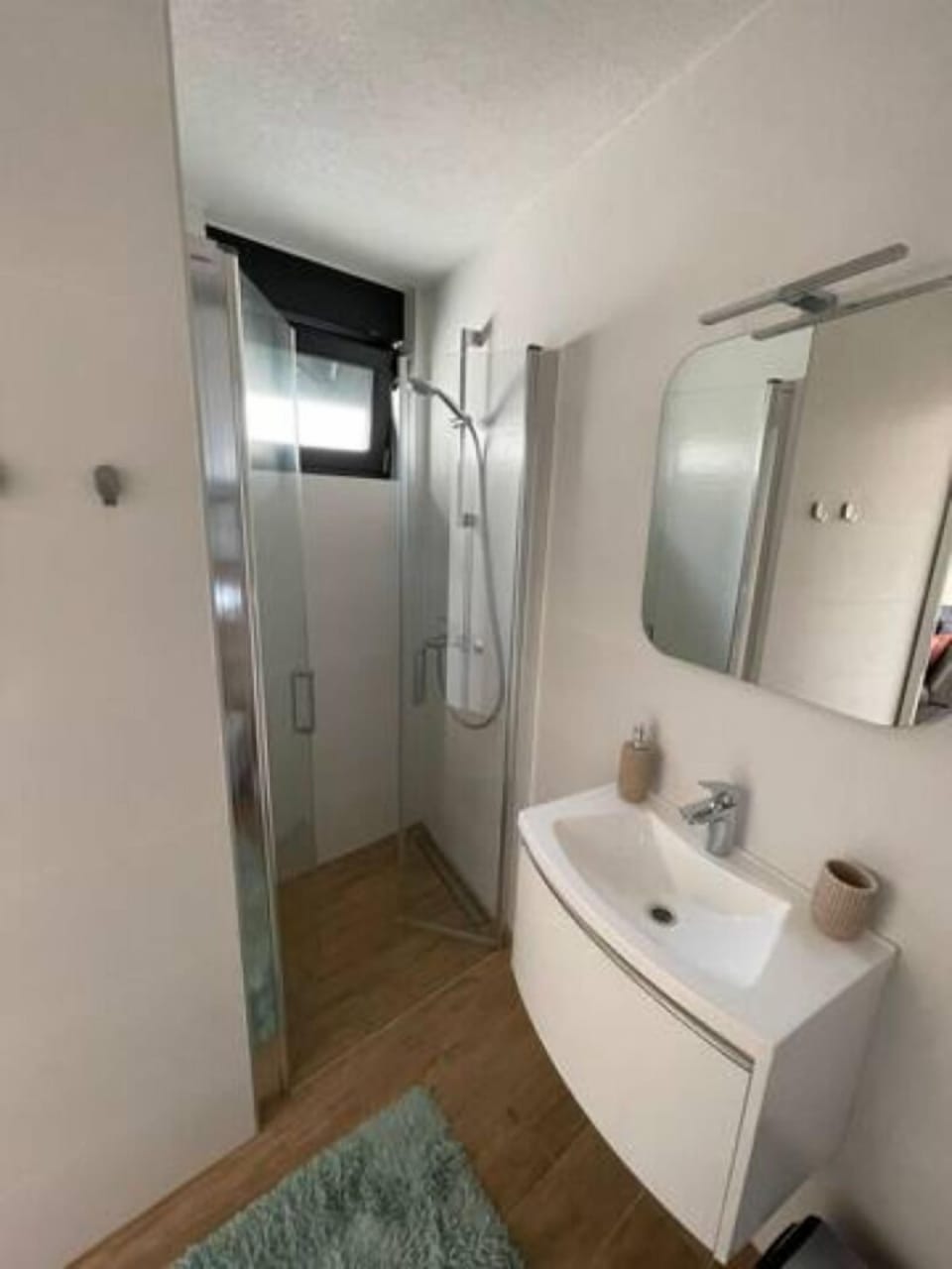 Deluxe Studio | Bathroom | Shower, hair dryer, towels, soap