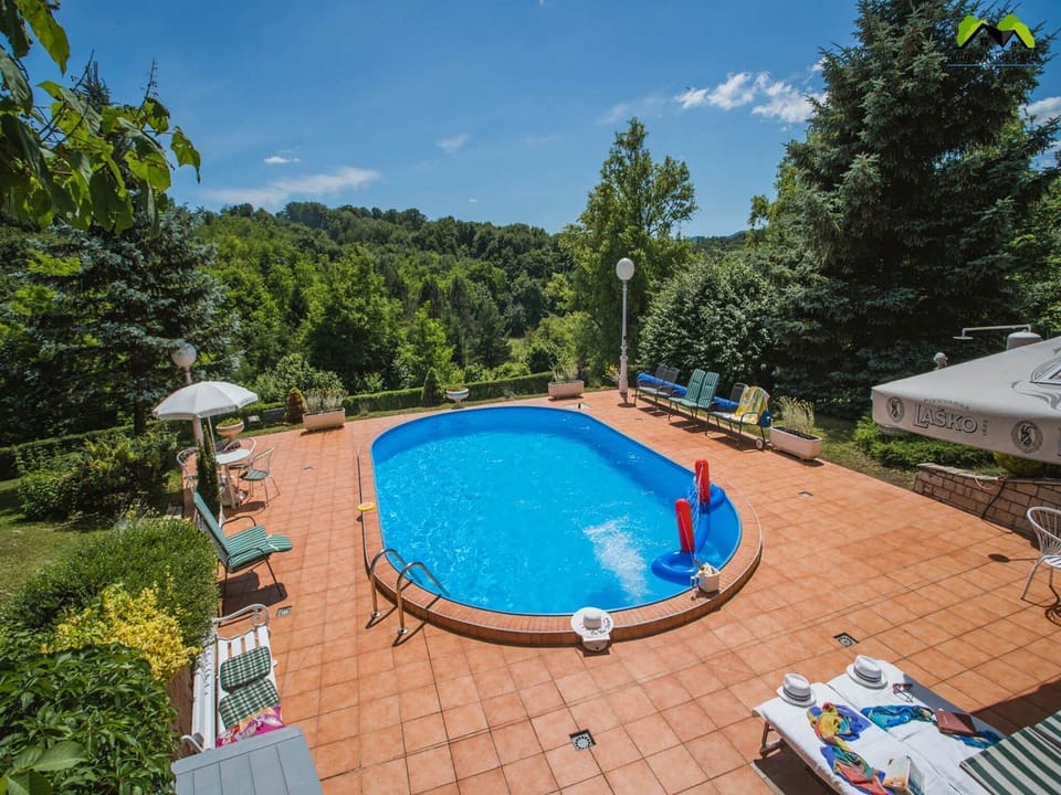 House (Two Bedroom Holiday Home with Swimmin) | Pool | Seasonal outdoor pool, pool umbrellas, sun loungers