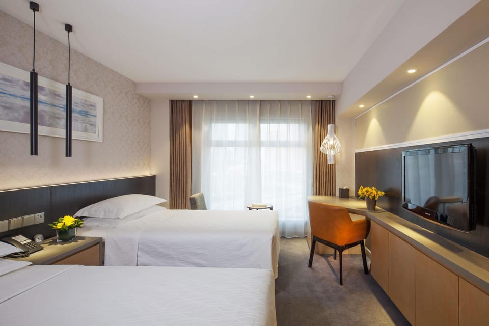 Hypo-allergenic bedding available, minibar, in-room safe, desk