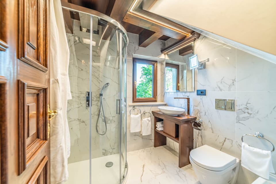 Luxury Room | Bathroom | Designer toiletries, hair dryer, bathrobes, bidet