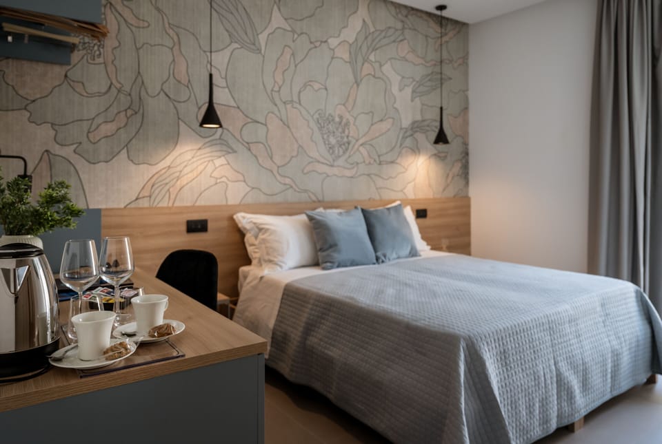 Deluxe Double or Twin Room | Down comforters, free minibar items, in-room safe