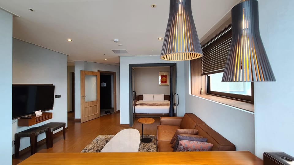 Family Suite | Living area | Flat-screen TV