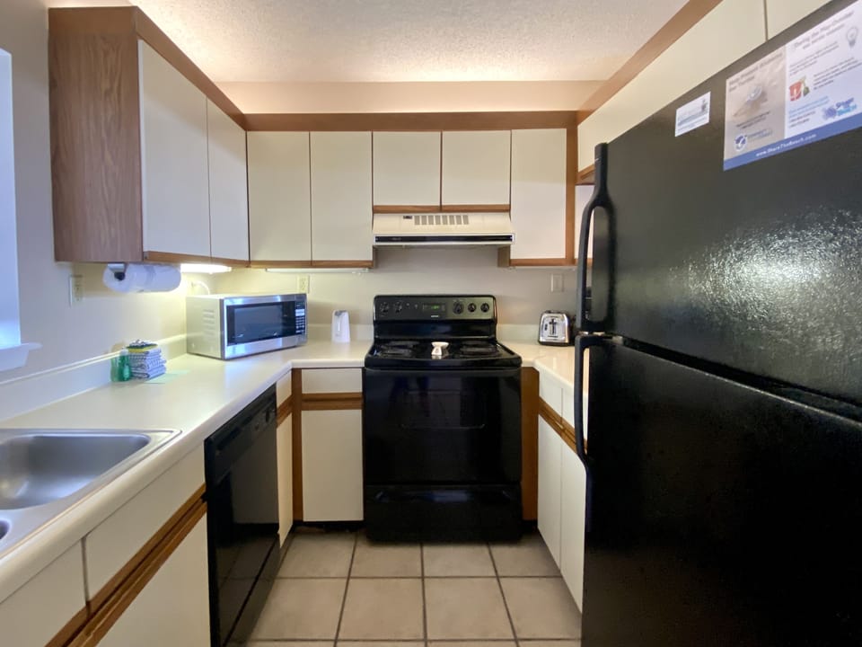 Condo, 2 Bedrooms, Balcony, Partial Ocean View | Private kitchen | Full-size fridge, microwave, oven, stovetop
