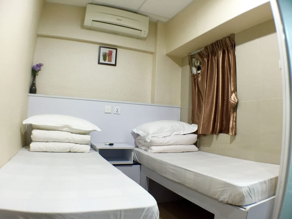 Standard Twin Room | Blackout drapes, iron/ironing board, free WiFi, bed sheets