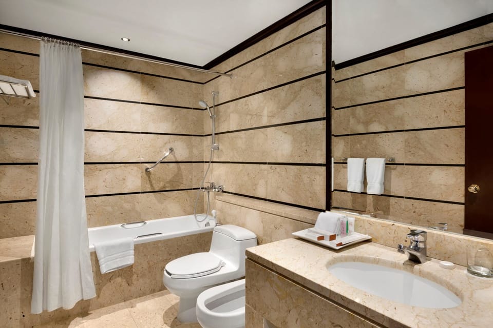 Suite, 3 Bedrooms | Minibar, in-room safe, soundproofing, iron/ironing board