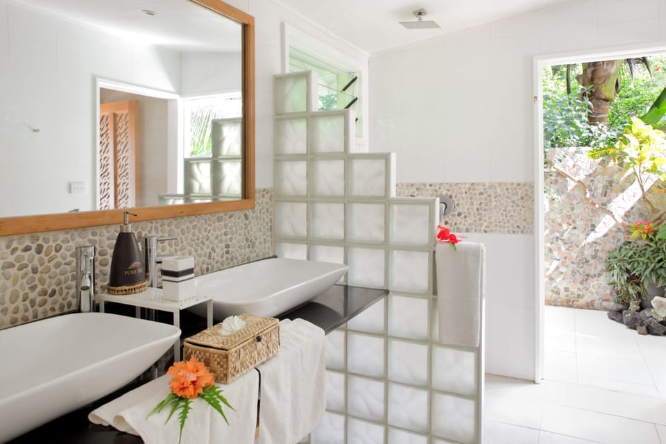 Designer toiletries, hair dryer, bathrobes, towels