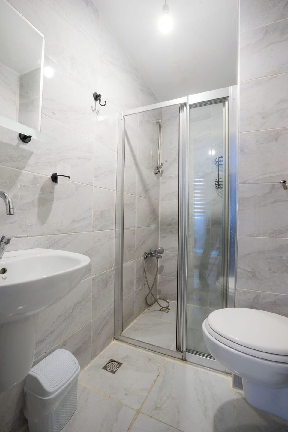 Design Studio | Bathroom | Shower, rainfall showerhead, hair dryer, slippers