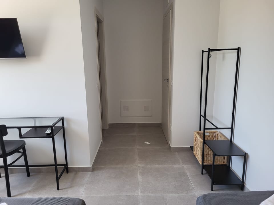 Standard Triple Room | Desk, blackout drapes, iron/ironing board, free WiFi