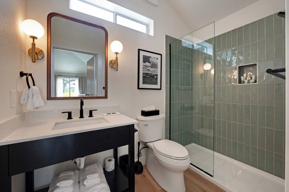 Deluxe Room, 2 Queen Beds | Bathroom | Hair dryer, towels