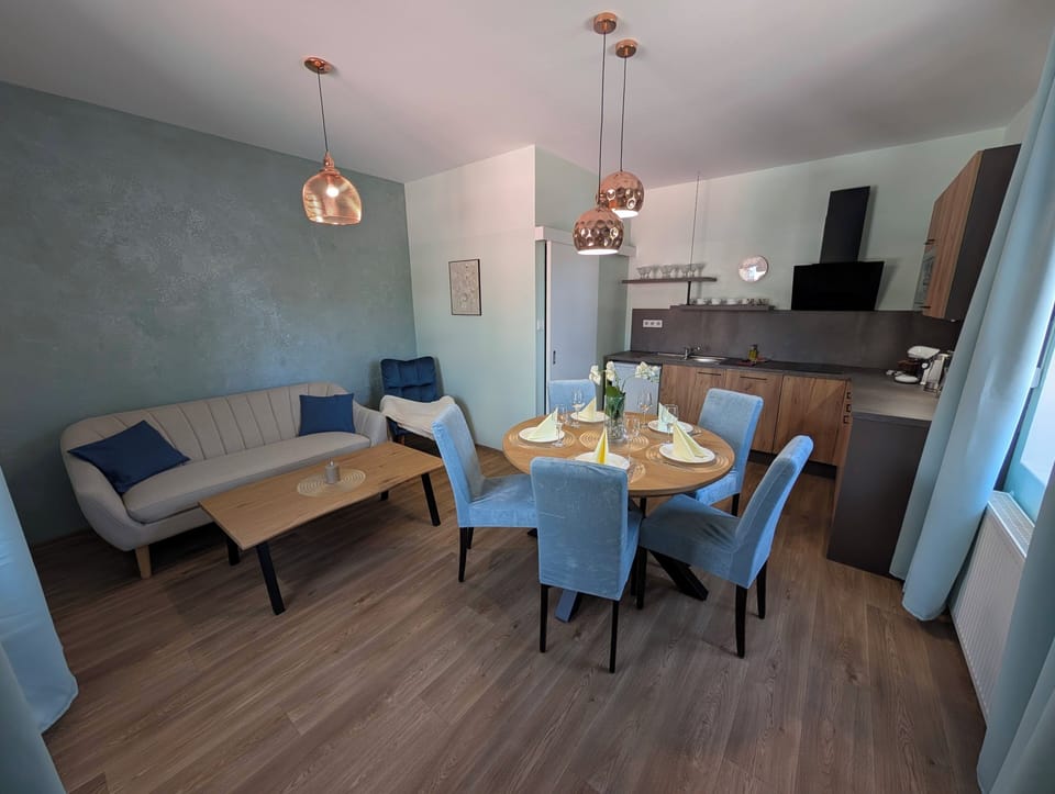 Basic Suite, 2 Bedrooms | Living area | LCD TV