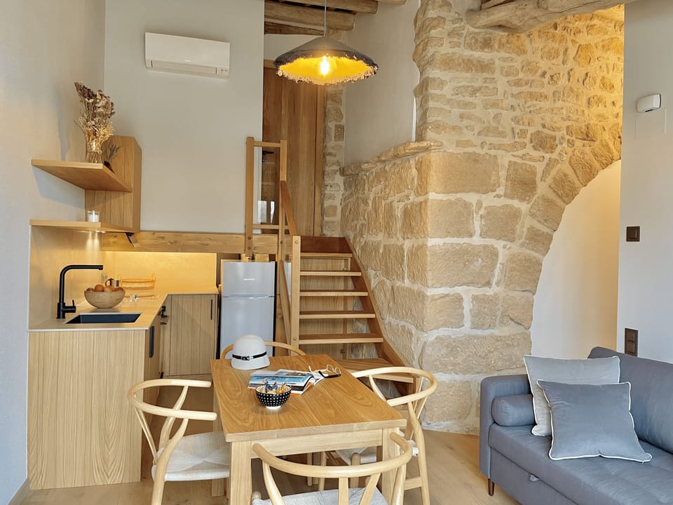 Masia de Queralt | Living area | TV, heated floors